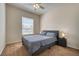 Bedroom featuring a window letting in natural light, ceiling fan and carpeted floors at 6936 Della Dr # 33, Orlando, FL 32819