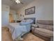 Bedroom features a comfortable sitting area and an attached bathroom for added convenience at 6936 Della Dr # 33, Orlando, FL 32819