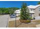 Exterior of a cozy home with mature landscaping, set on a tree-lined street at 6936 Della Dr # 33, Orlando, FL 32819
