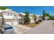 Exterior view of a lovely home featuring a well-manicured lawn with mature trees at 6936 Della Dr # 33, Orlando, FL 32819