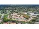 Scenic aerial view of a condominium community with lush trees and water views at 696 Seabrook Ct # 101, Altamonte Springs, FL 32714