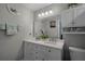 Bathroom featuring dual sinks, modern fixtures, and ample storage space at 696 Seabrook Ct # 101, Altamonte Springs, FL 32714
