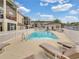 Resort-style pool with lounge chairs for relaxation and access to the condo units at 696 Seabrook Ct # 101, Altamonte Springs, FL 32714
