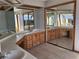 Spacious bathroom showcasing dual sinks with wooden cabinets and a large mirrored closet at 736 Silverwood Dr, Lake Mary, FL 32746