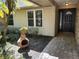 Well-maintained front entrance with beautiful landscaping and neutral siding at 736 Silverwood Dr, Lake Mary, FL 32746