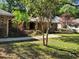 Landscaped front yard with a stone walkway that leads to the front door at 736 Silverwood Dr, Lake Mary, FL 32746