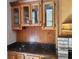 Living room wet bar with granite countertops at 736 Silverwood Dr, Lake Mary, FL 32746