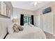 Bright bedroom with balcony access, ample closet space, and a ceiling fan at 806 Lucaya Loop, Davenport, FL 33897