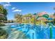 Vibrant splash pad area with colorful water features and playful designs for children at 806 Lucaya Loop, Davenport, FL 33897