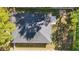 Aerial view of the house showing the backyard with a wooden fence and trees at 851 W 24Th Pl, Sanford, FL 32771