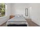 Bright bedroom featuring a comfy bed, soft carpet and natural light filtering through a window at 851 W 24Th Pl, Sanford, FL 32771