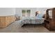 Inviting bedroom with carpet flooring and a large window providing natural light at 851 W 24Th Pl, Sanford, FL 32771