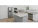 Modern kitchen features granite countertops, stainless steel appliances, and a center island at 851 W 24Th Pl, Sanford, FL 32771
