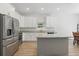 Modern kitchen featuring stainless steel appliances, granite countertops and center island at 851 W 24Th Pl, Sanford, FL 32771