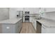 Well-designed kitchen with stainless steel appliances, granite countertops, and ample cabinet space at 851 W 24Th Pl, Sanford, FL 32771