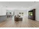 Spacious living area with hardwood floors and ample natural light at 851 W 24Th Pl, Sanford, FL 32771
