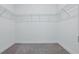A walk-in closet with carpet flooring, white walls, and wire shelving at 851 W 24Th Pl, Sanford, FL 32771