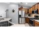 Spacious kitchen featuring stainless steel appliances and sleek countertops at 9054 Sandwood Way, Orlando, FL 32832