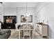 Elegant dining space and living area featuring stylish décor and an open layout at 9054 Sandwood Way, Orlando, FL 32832