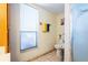 Inside this water closet is a toilet, towel rack, and a shower at 9501 Holbrook Dr, Orlando, FL 32817