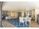 The covered patio has an outdoor seating and dining area, with sliding door access to the house at 9501 Holbrook Dr, Orlando, FL 32817