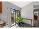 Bright dining area with sliding glass door to patio and a view to the outdoors at 9501 Holbrook Dr, Orlando, FL 32817