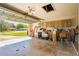 Well-lit garage featuring overhead door and access to the driveway and the exterior at 9501 Holbrook Dr, Orlando, FL 32817