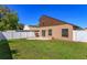 This fenced backyard has a small patio and lush lawn that provides ample space at 10020 Creekwater Blvd, Orlando, FL 32825