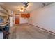 Spacious garage with built-in shelving, overhead lighting, and convenient access to the home at 10020 Creekwater Blvd, Orlando, FL 32825