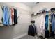 Walk-in closet with wire shelving for optimal clothing and storage at 10655 Village Lake Rd, Windermere, FL 34786