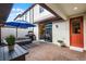 Private patio with outdoor dining and lounge area, perfect for entertaining at 10655 Village Lake Rd, Windermere, FL 34786