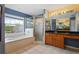 The primary bathroom features a soaking tub, a glass-enclosed shower, and dual vanities at 110 Wekiva Pointe Cir, Apopka, FL 32712
