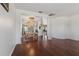 Open dining area features a dazzling chandelier and mirrored accent wall at 110 Wekiva Pointe Cir, Apopka, FL 32712