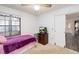 Bright bedroom with a ceiling fan and a window; great natural lighting at 1148 Monroe Ave, St Cloud, FL 34769