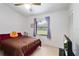 This bedroom features a window that lets in lots of natural light at 1148 Monroe Ave, St Cloud, FL 34769