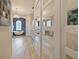 Large bathroom with a free-standing tub, separate glass shower, double vanity, chandelier, and unique stained glass window at 116 Cherry Creek Cir, Winter Springs, FL 32708