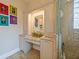 Bathroom vanity with granite countertops, cabinets and makeup mirror niche at 116 Cherry Creek Cir, Winter Springs, FL 32708