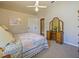 Bedroom features a bed and a makeup mirror and natural light at 116 Cherry Creek Cir, Winter Springs, FL 32708