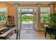Elegant dining room with access to a stunning pool and backyard oasis at 116 Cherry Creek Cir, Winter Springs, FL 32708