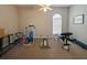 Spacious exercise room with natural light, ideal for home workouts at 116 Cherry Creek Cir, Winter Springs, FL 32708