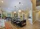 Open-concept kitchen featuring a large island, pendant lighting, and modern appliances at 116 Cherry Creek Cir, Winter Springs, FL 32708