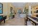Inviting open-concept living area with elegant decor, tile flooring, and a grand entrance at 116 Cherry Creek Cir, Winter Springs, FL 32708
