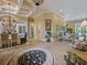 Open concept living space showcasing the dining room, and multiple seating areas at 116 Cherry Creek Cir, Winter Springs, FL 32708