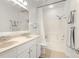 Clean bathroom featuring a double vanity, shower, and bathtub at 12016 Villanova Dr # 101, Orlando, FL 32837