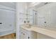 Clean and bright bathroom features a large vanity, a toilet and a shower-tub combo at 1236 Villa Ln # 143, Apopka, FL 32712