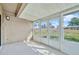 Bright sunroom offers views of the landscaped lawn, many windows allow ample light at 1236 Villa Ln # 143, Apopka, FL 32712