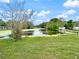 Backyard view shows proximity to the water at 1248 Honeytree W Ln, Lakeland, FL 33801