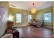 bedroom featuring dinosaur wall art, a twin bed, and ample natural light from multiple windows at 13301 Mcmillan Dr, Orlando, FL 32827