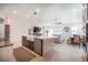 Modern kitchen with stainless steel appliances, dark cabinets, and an open layout to the living space at 13301 Mcmillan Dr, Orlando, FL 32827