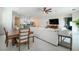 Open floor plan with living room, dining area, and kitchen, great for entertaining guests at 13301 Mcmillan Dr, Orlando, FL 32827